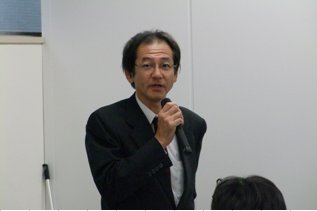 菅様による講演